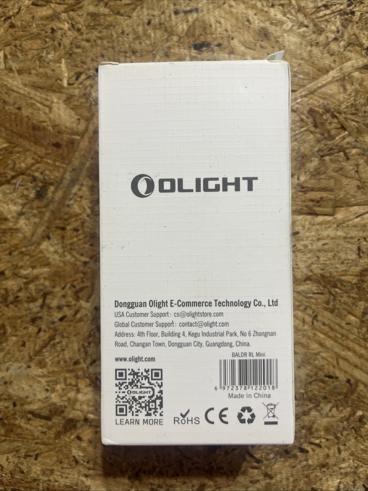 Olight Baldr RL Mini tactical light with red beam laser, black