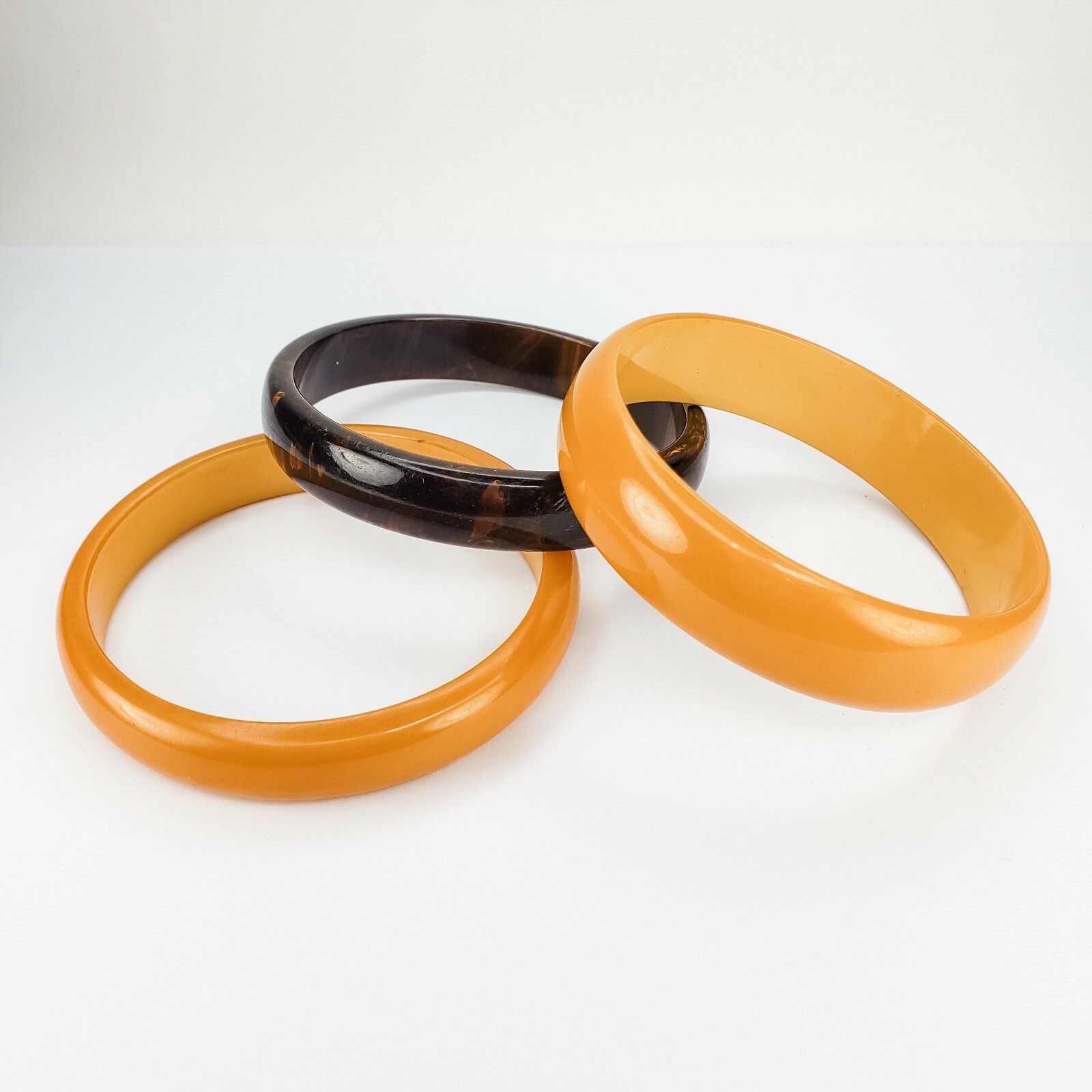 Set of 3 Two Butterscotch Yellow and One Brown Swirled Bakelite Bangle Bracelets