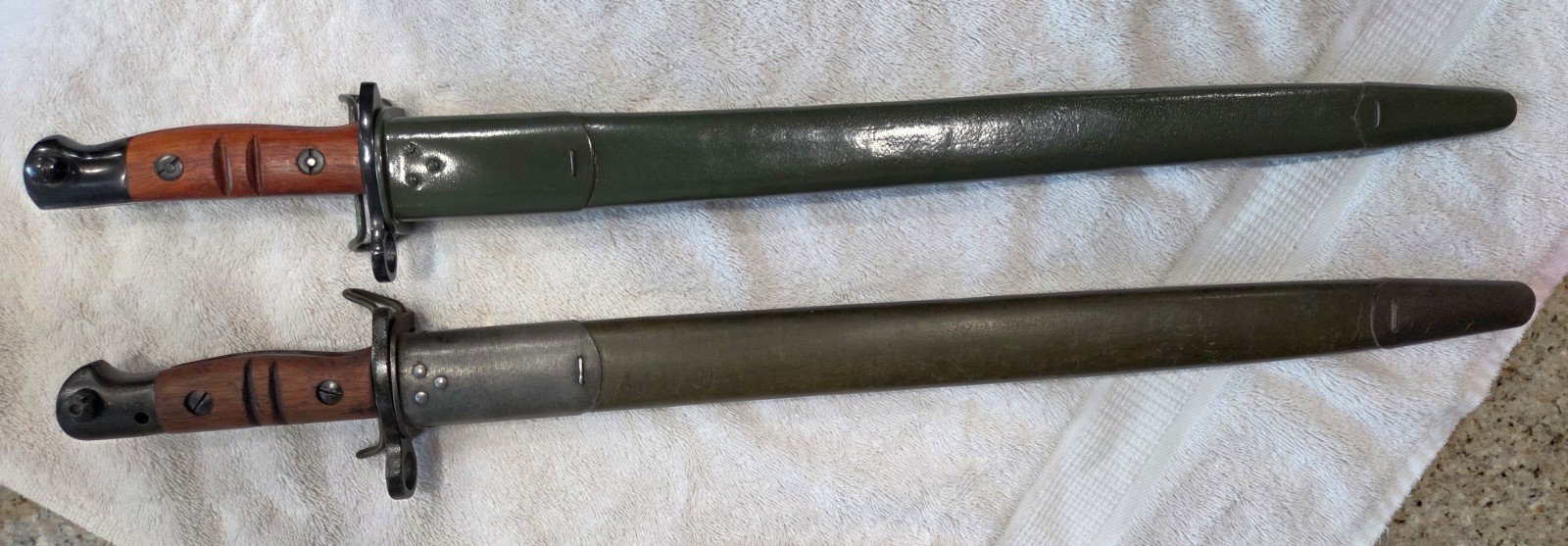 Real U.S. WWI Winchester Built M1917 Enfield Bayonet and a Repro also