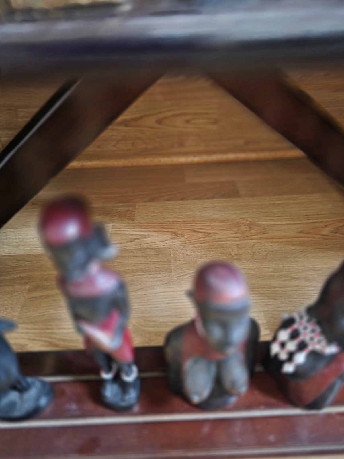 Set of carved statues from black wood, stone, bronze.