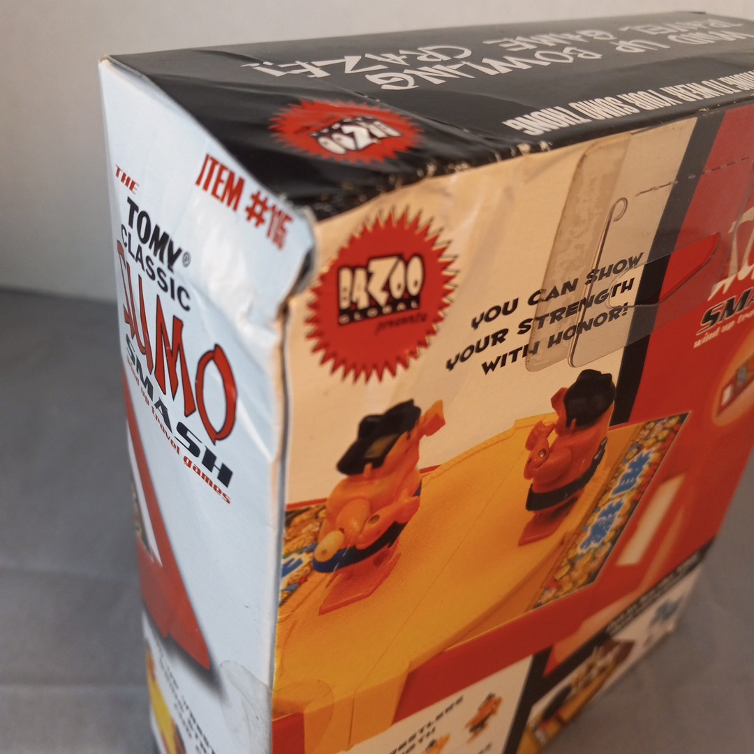 Tomy Classics Sumo Smash Wind Up Travel Game 2009 Bazoo Global New W Box Damage