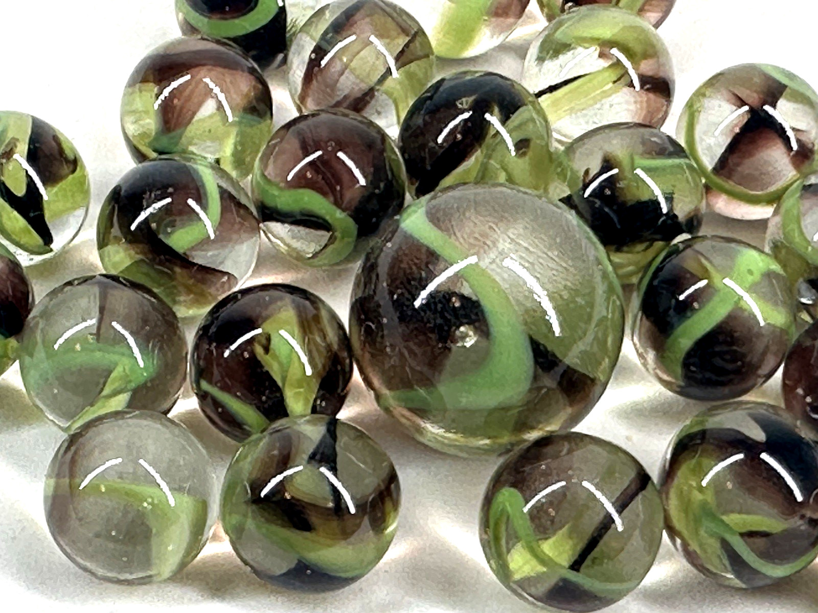 25 Glass Marbles BIGFOOT Clear/Green/Brown Shooter game Pack Swirl
