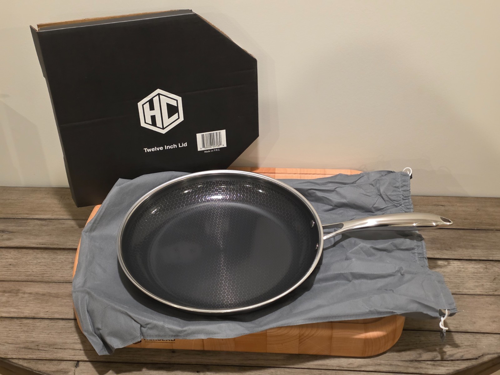 HexClad Hybrid Nonstick 12-Inch Frying Pan with Tempered Glass Lid - $199 MSRP