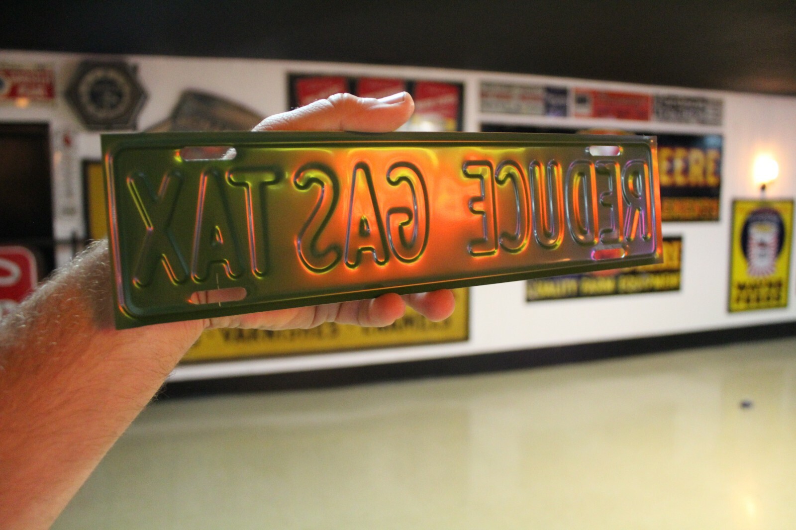 RARE REDUCE THE GAS TAX PLATE TOPPER EMBOSSED METAL SIGN SALES GAS OIL FORD