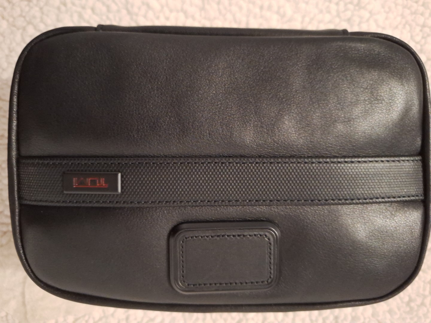 TUMI 100% Leather Split Travel Kit. Black Brand New Kit Valued At $165.00.