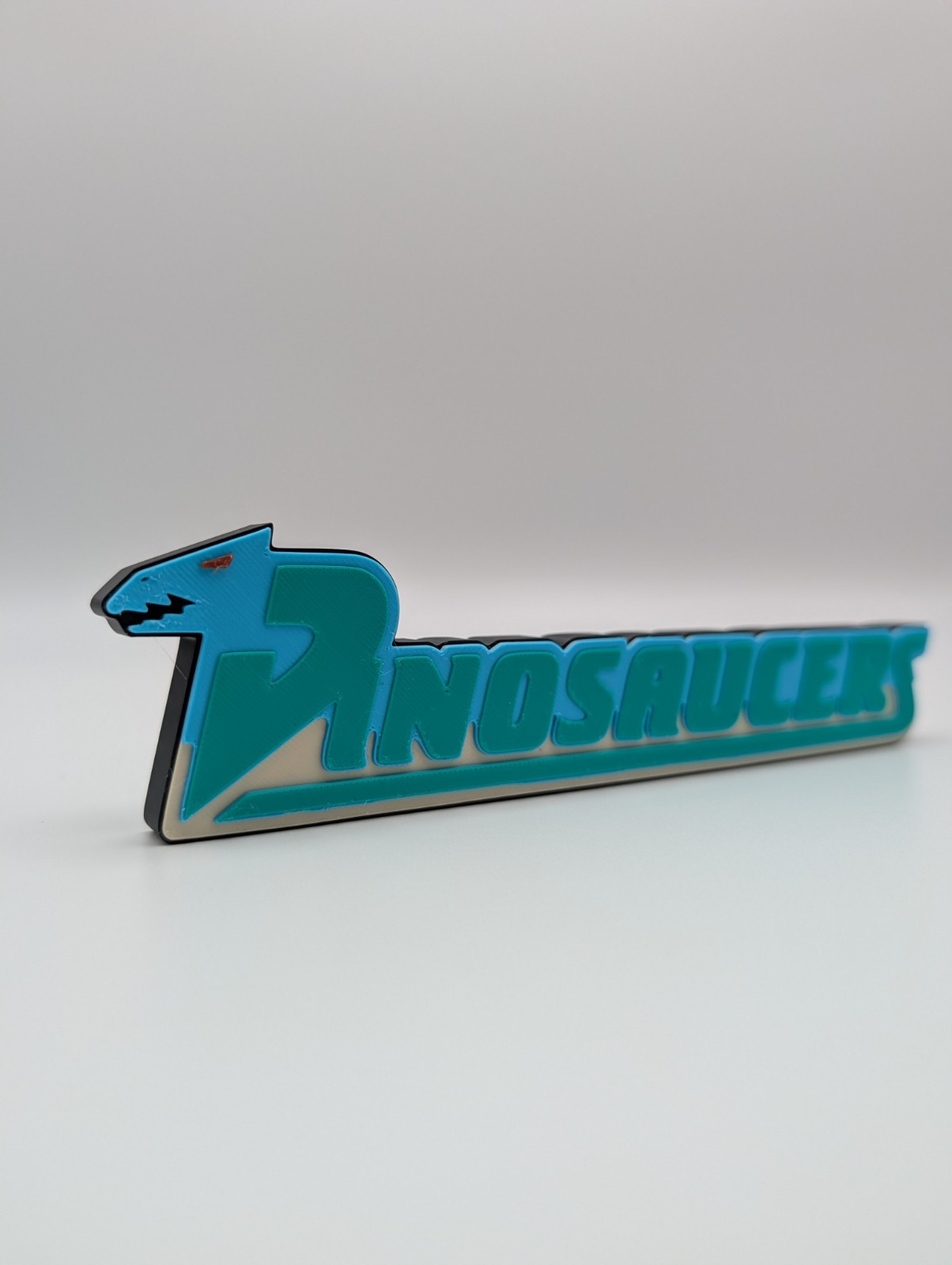 Dinosaucers Logo Display Sign For Collections