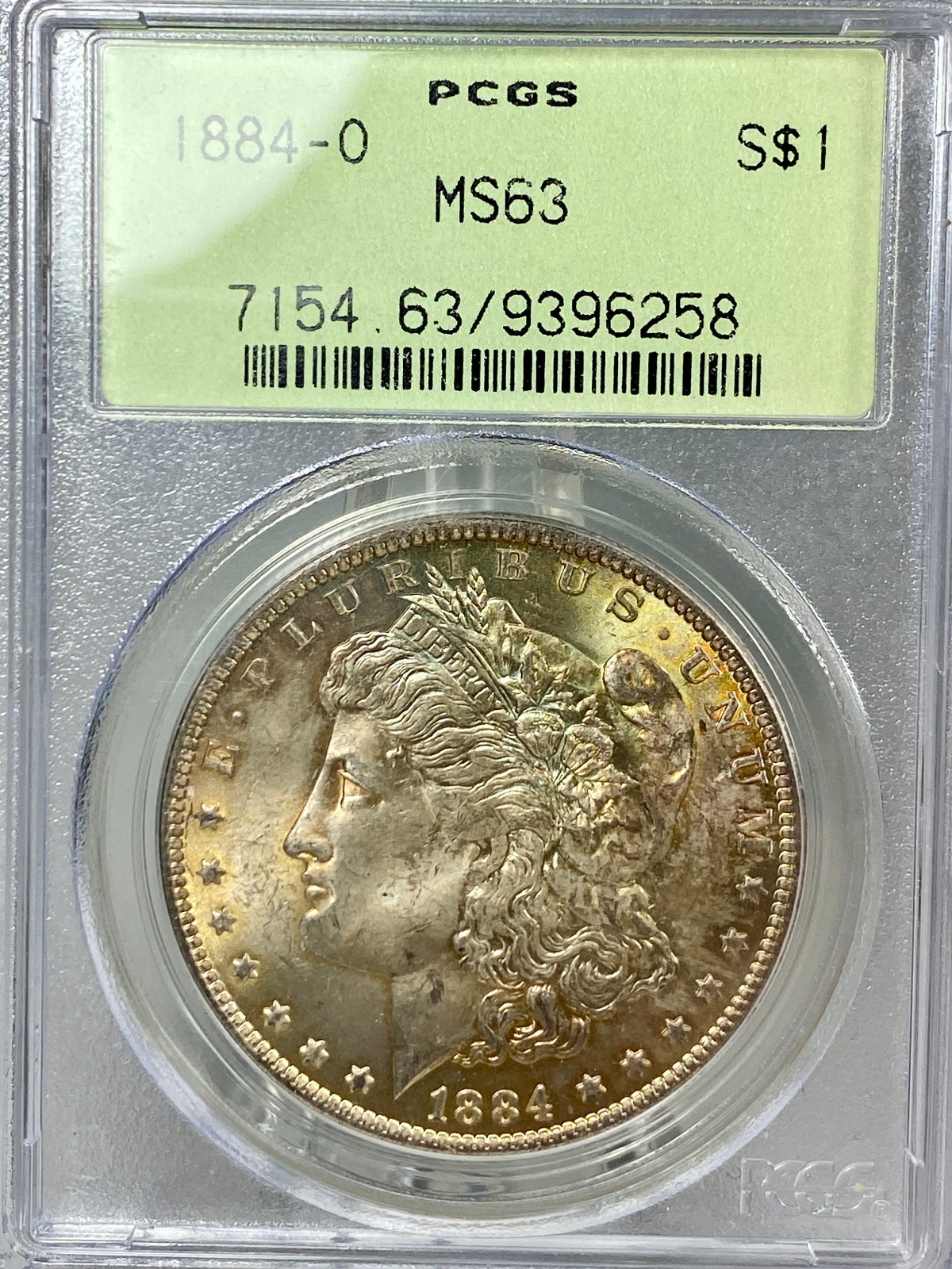 1884-O Morgan Silver 1$ Dollar PCGS MS 63 OGH Yellow with Blue Toned