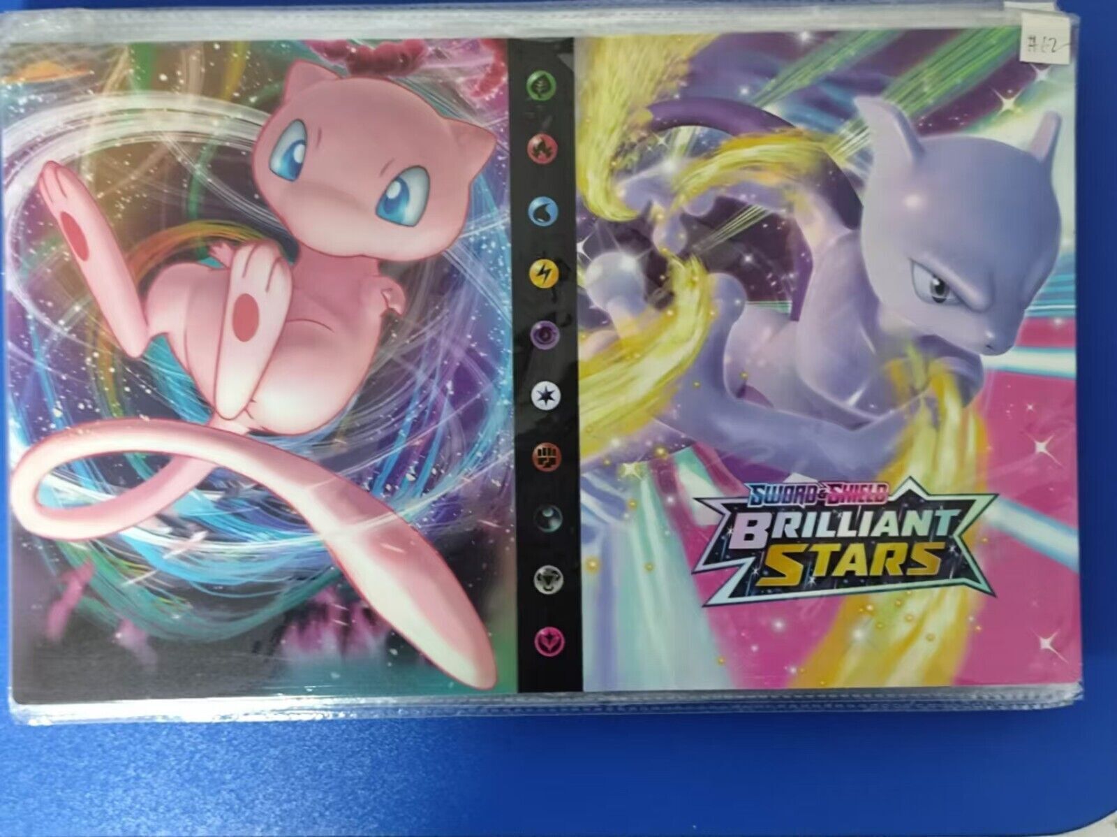 55 randomized Pokémon cards + booklet with 120 cards 4 cards per page New!