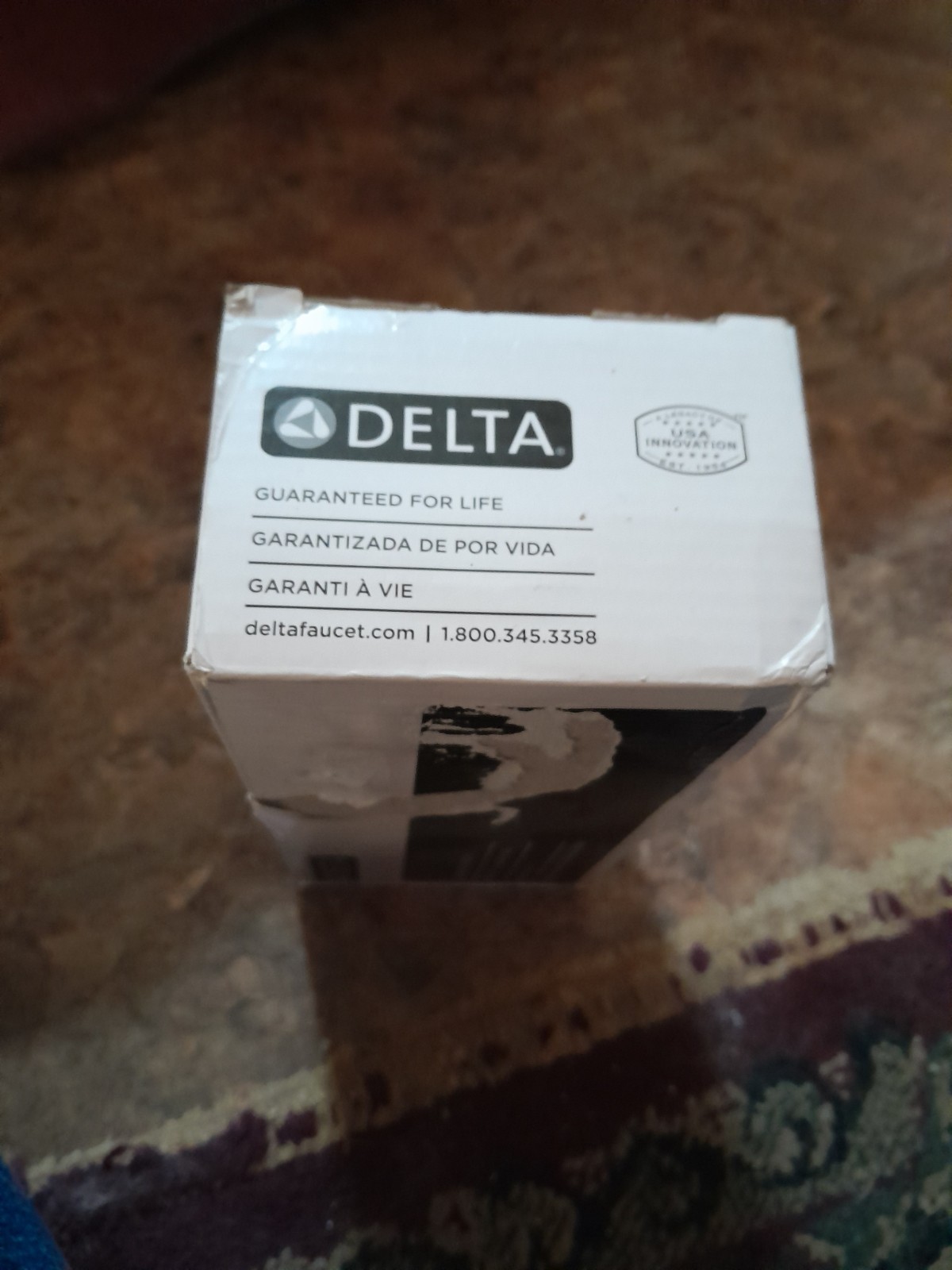 Delta 75950-SS Trinsic Single Bar Tissue Holder Champagne Bronze