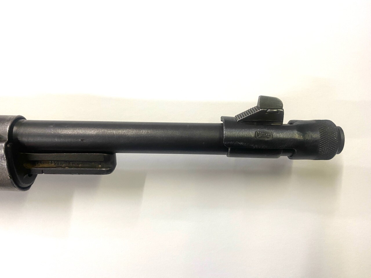 MAUSER 98K MUZZLE PROTECTOR MARKED "MAUSER".