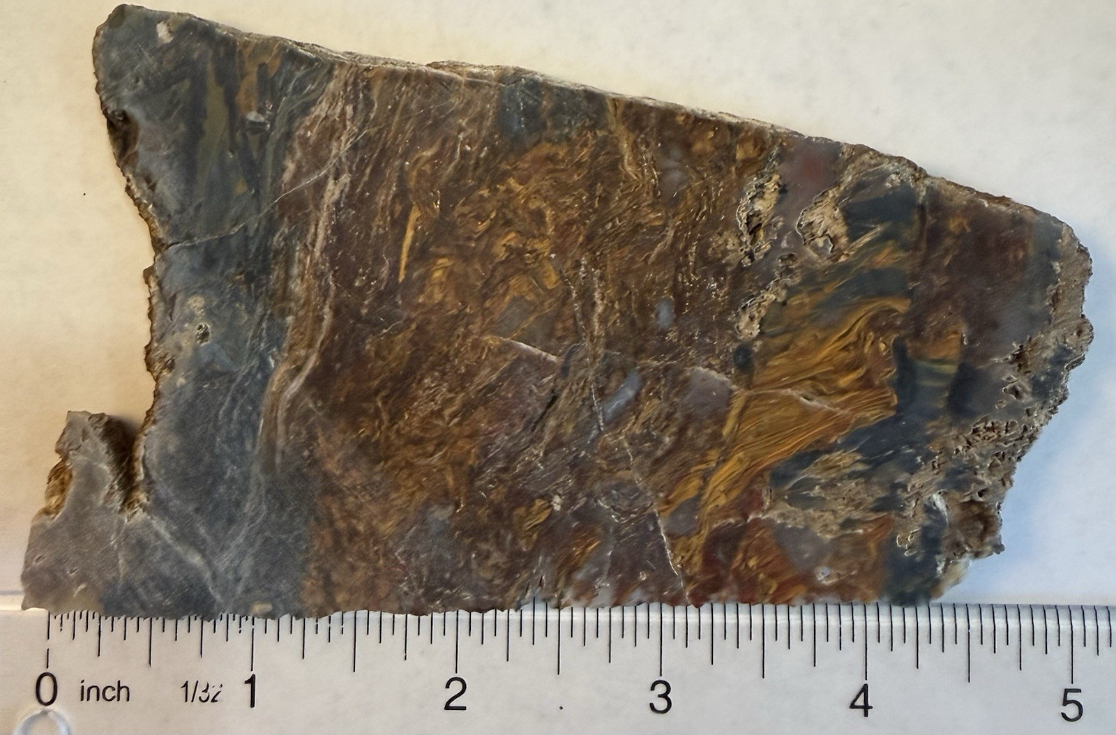 Pietersite Unpolished Slab. 4 5/8” x 2 7/8” x .25”, 3.7 Ounce. Imperfections.
