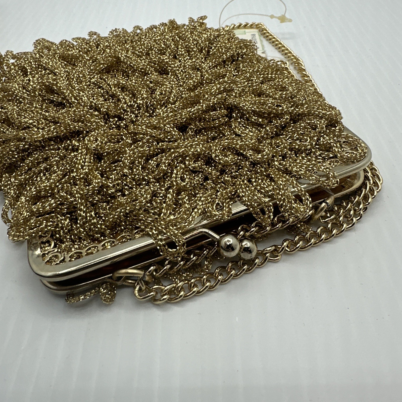 An exclusive import from Italy gold Tone purse R.N. 2906 vintage chain NWT