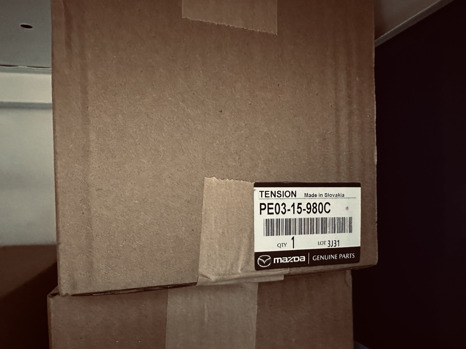 Genuine Mazda Tensioner PE03-15-980C