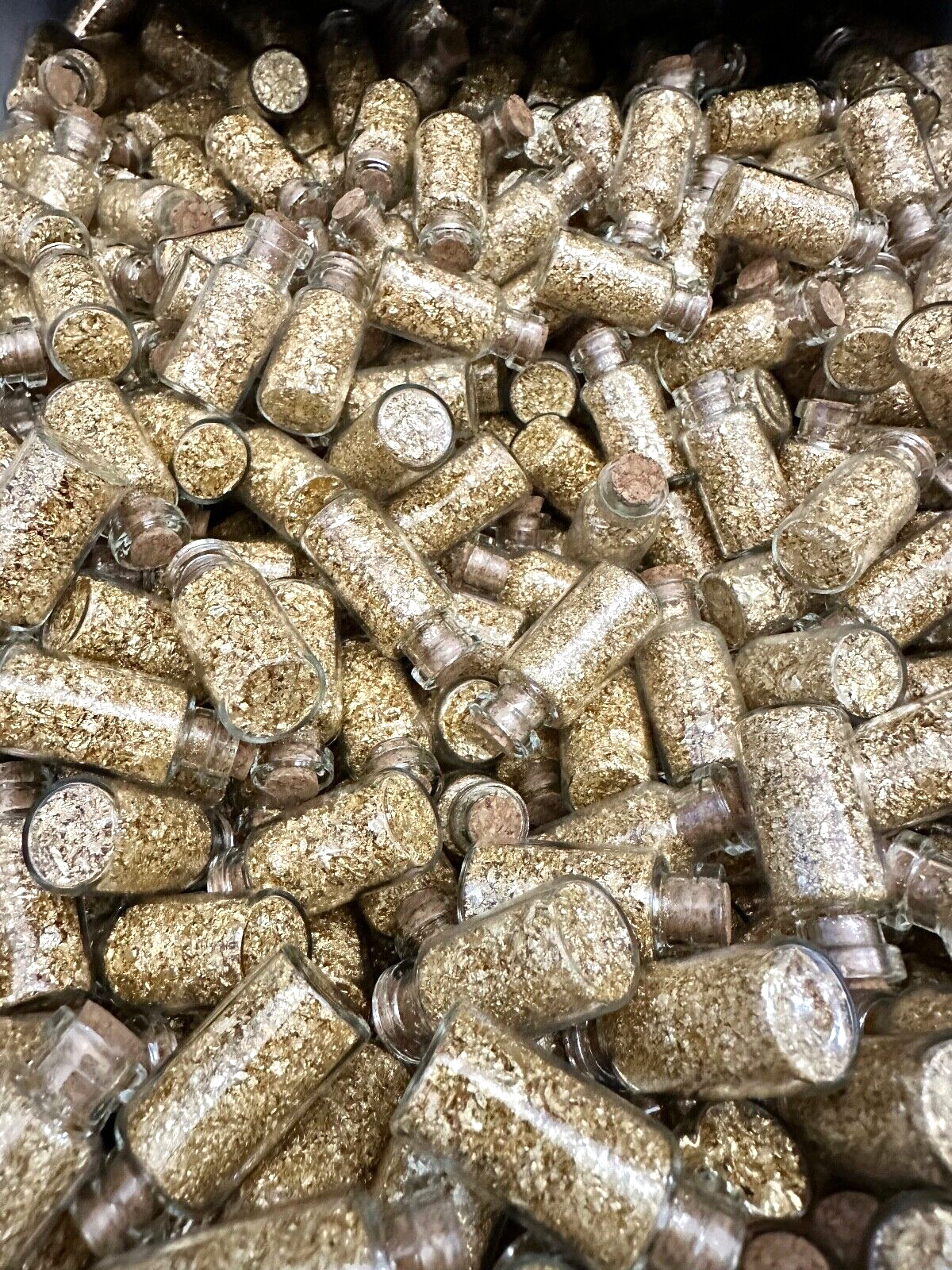 9 Bottles of Large Gold Flakes .....