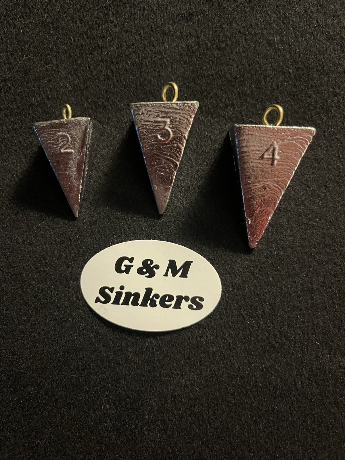 Assortment of Pyramid  11-2oz, 10-3oz, and 8-4oz Fishing Sinkers Made in USA