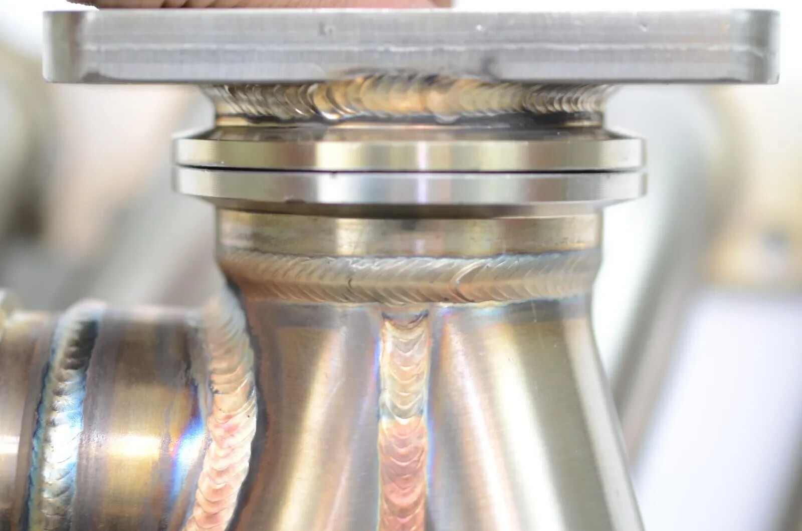 All Out Fab Precision turbo v-band to T3 adapter with hardware and clamp