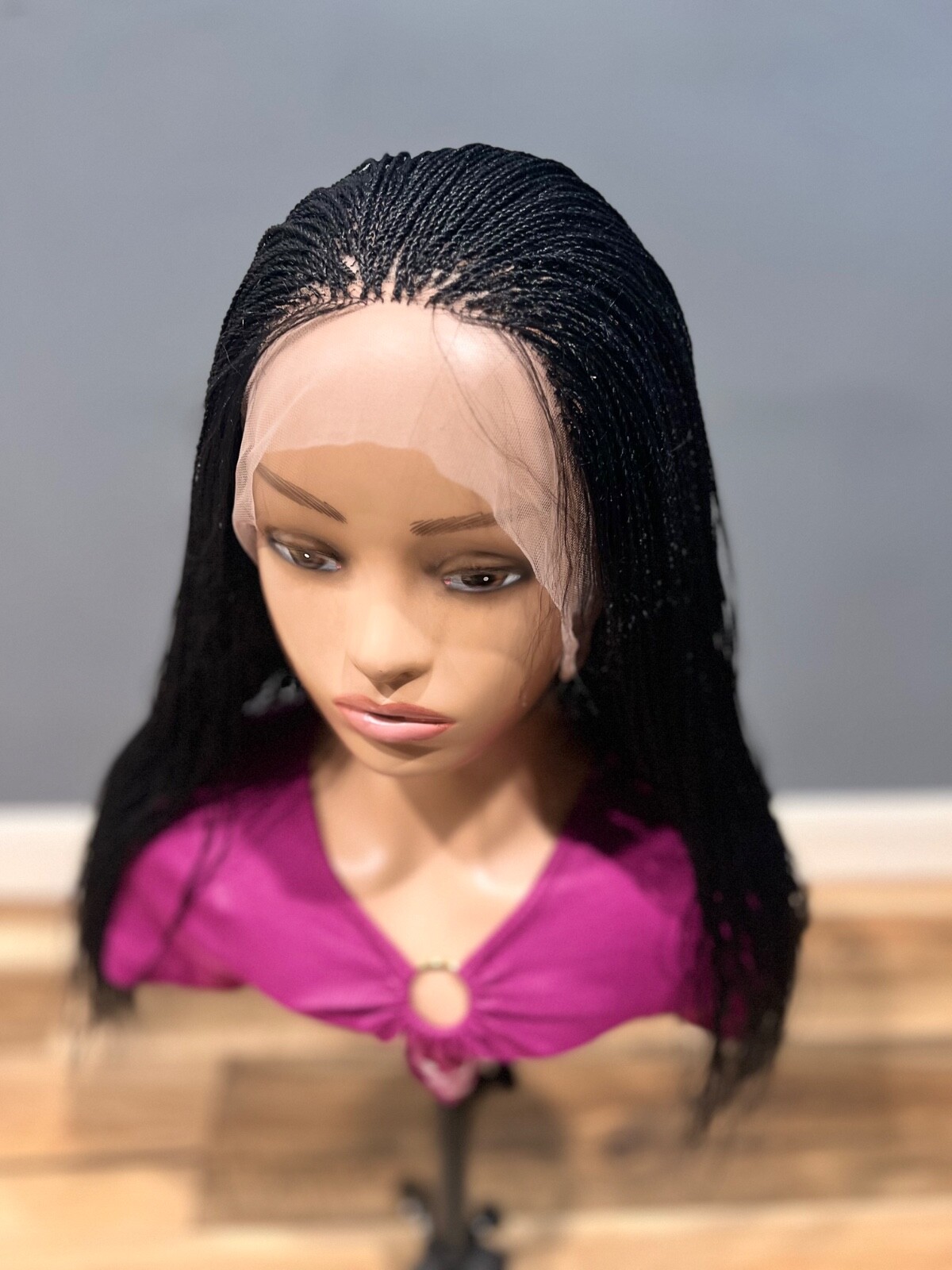 BRAIDED MICRO TWIST WIG . Madeon a full lace wig.length is 24”long..color black.