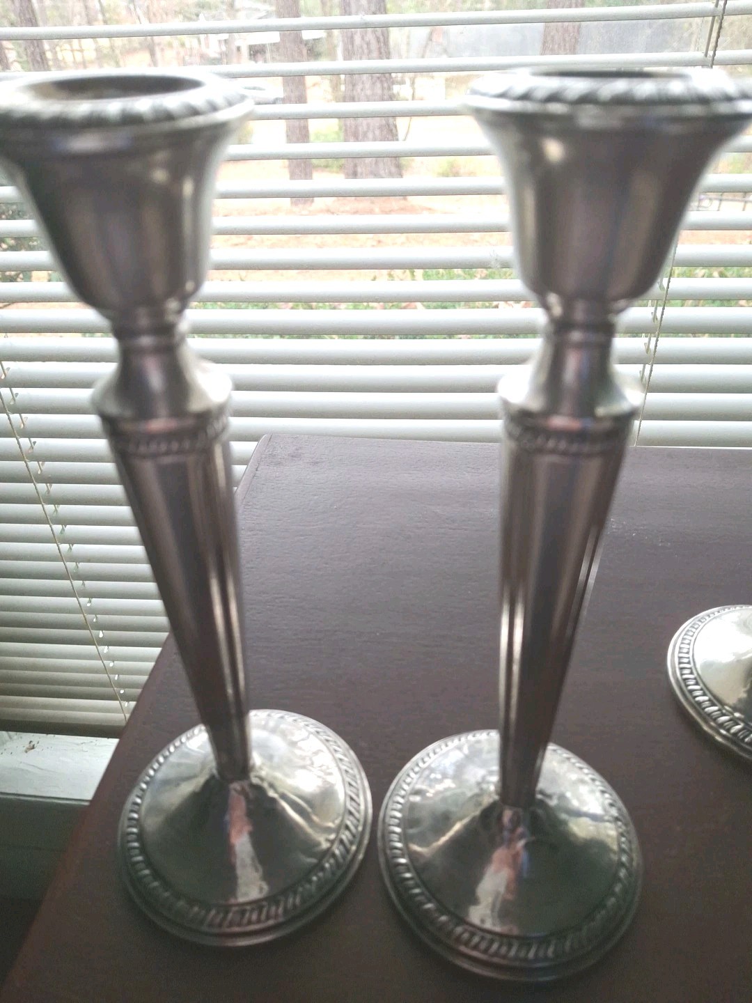 A rare Pair Of Sterling Silver Candelabras   By CROWN. 8 In. Tall.