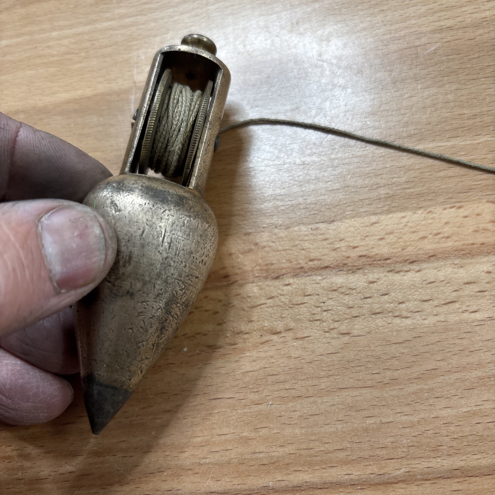 Vintage early Brass Plumb bob W / Integrated Reel Cord (Stanley?)
