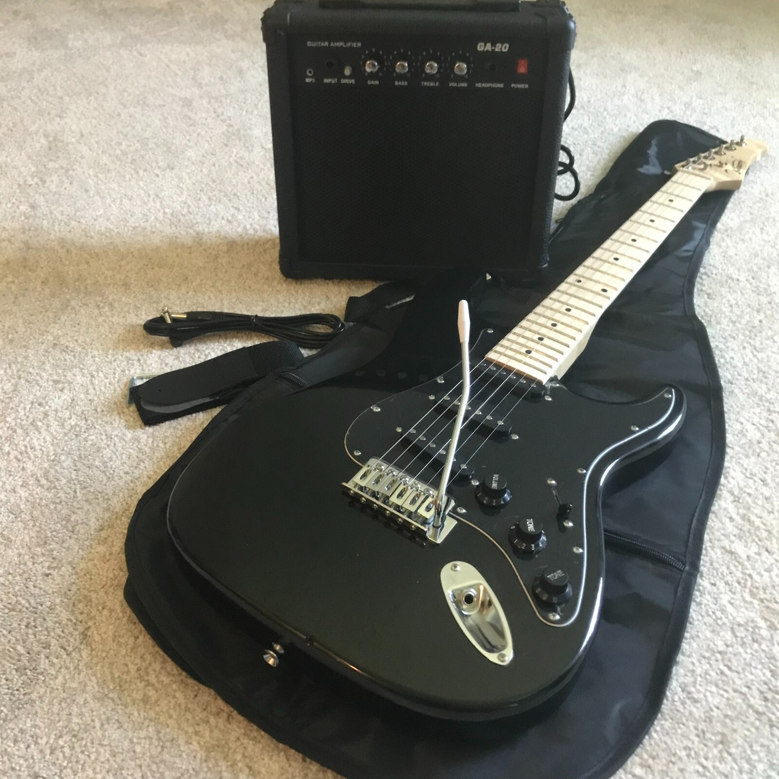 Full-Size Black Electric Guitar Starter Package with 20-Watt Amp and Accessories