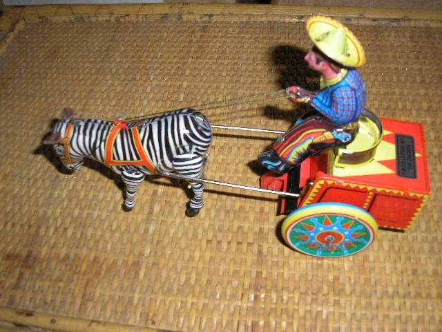 ZEBRA Tin TOY wind up cowboy & cart based on german Galop toy Schylling