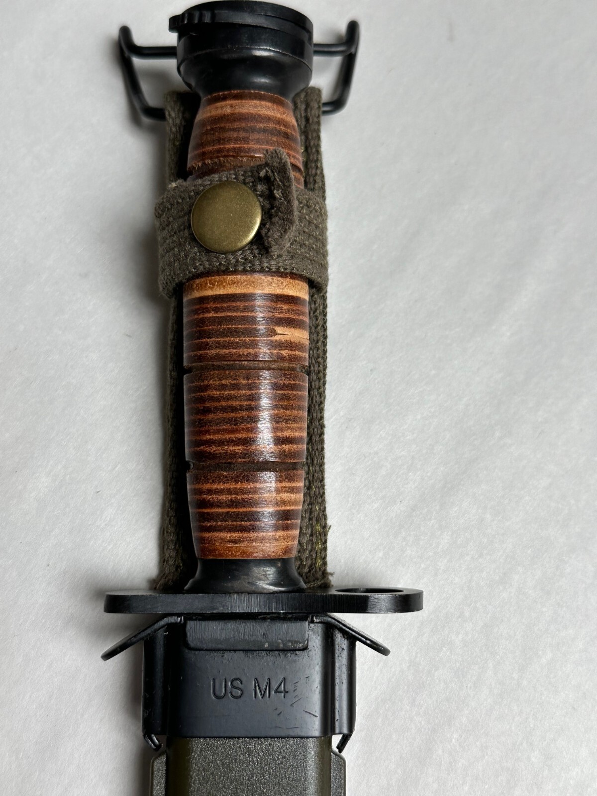 M1 CARBINE BAYONET LEATHER HANDLE WITH SCABBARD.