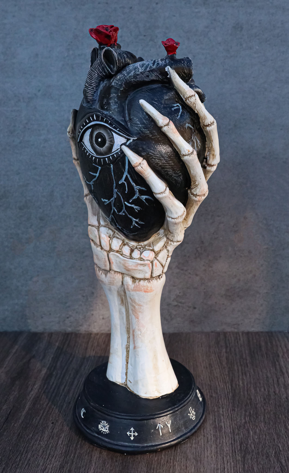 Gothic Alchemy Skeleton Hand Holding Black Anatomy Heart With Evil Eye Figurine