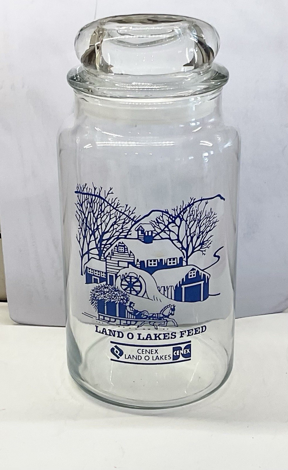 LAND O LAKES FEED / CENEX, 8" TALL GLASS CANISTER/BLUE WINTER SCENE