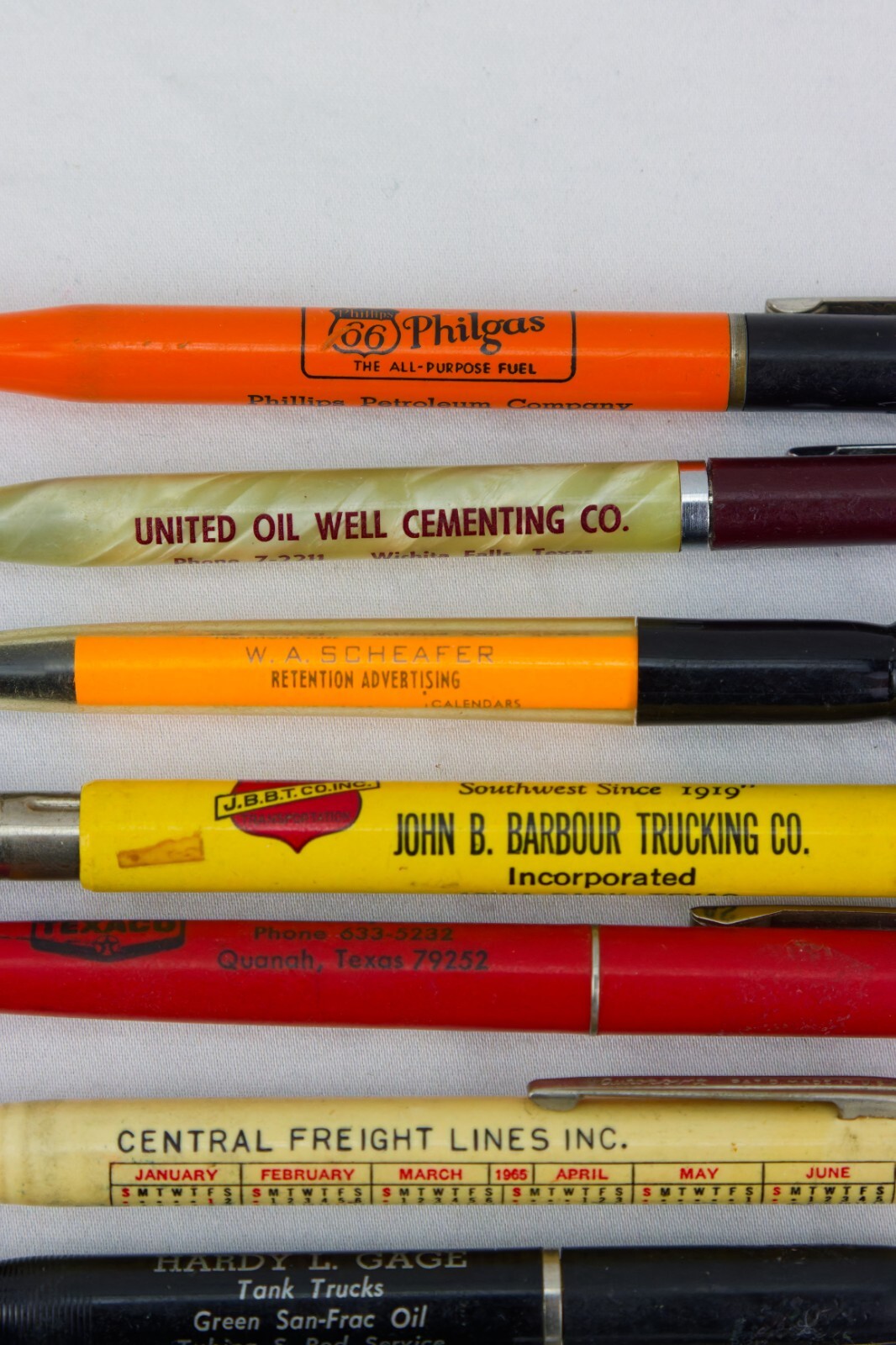 Oil, Trucking and Land Advert Items; Wood Box, Pencil Sharpener and Pens/Pencils