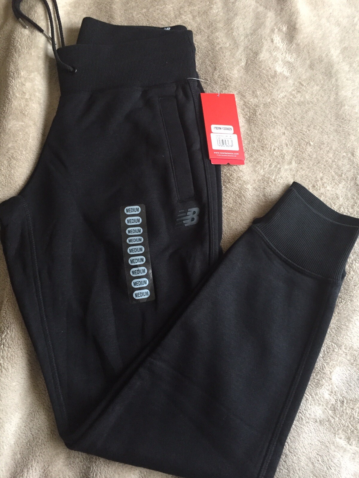 New Balance Women's Essentials Fleece Drawstring Sweatpant (Black, M)