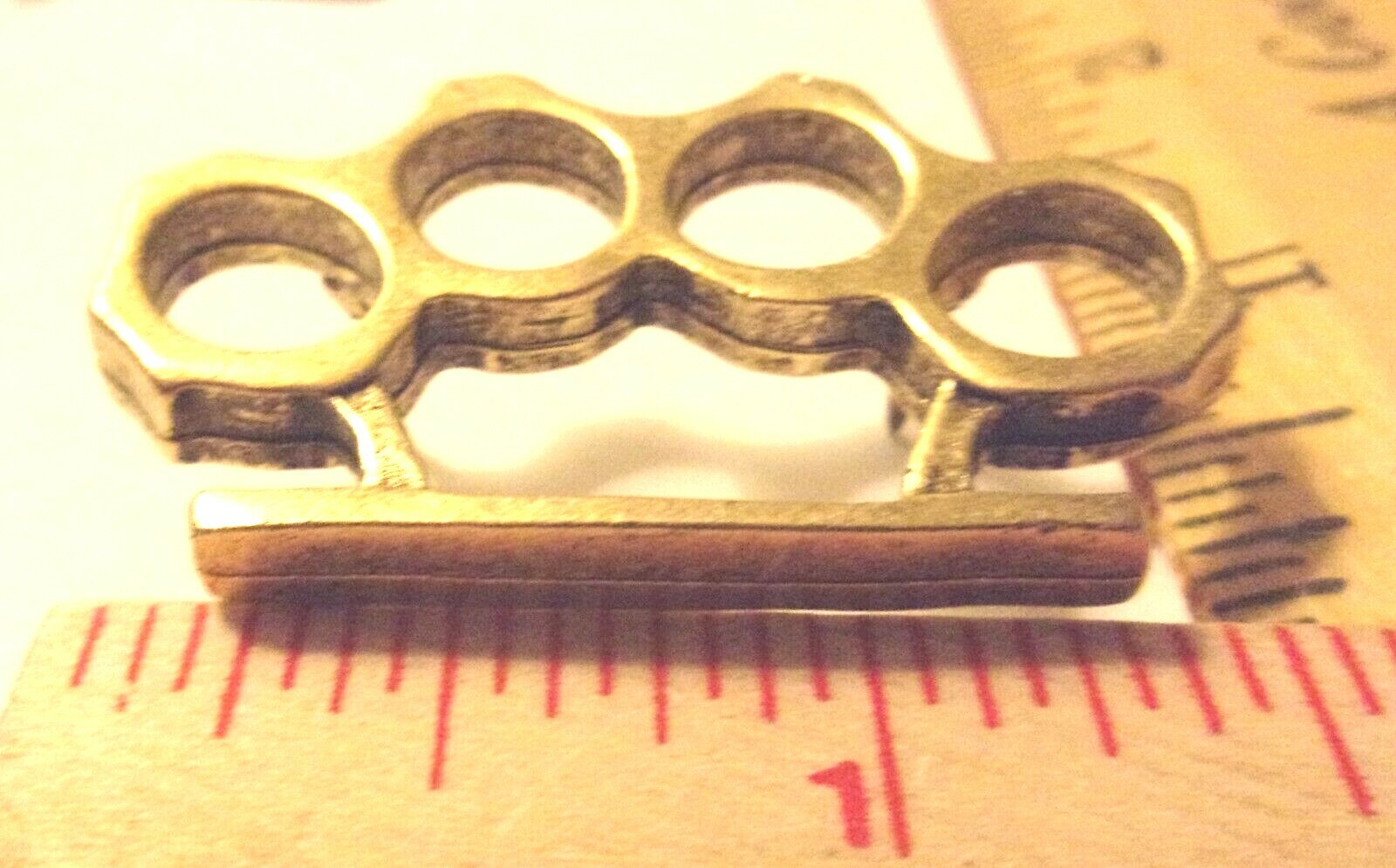 brass knuckles pin vintage collectible old biker vest hat weapon knuckle pinback
