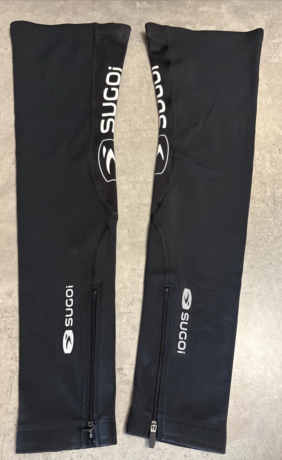 New With Tags Sugoi Zap Lined Side Zip Cycling Leg Warmers - Black - Large