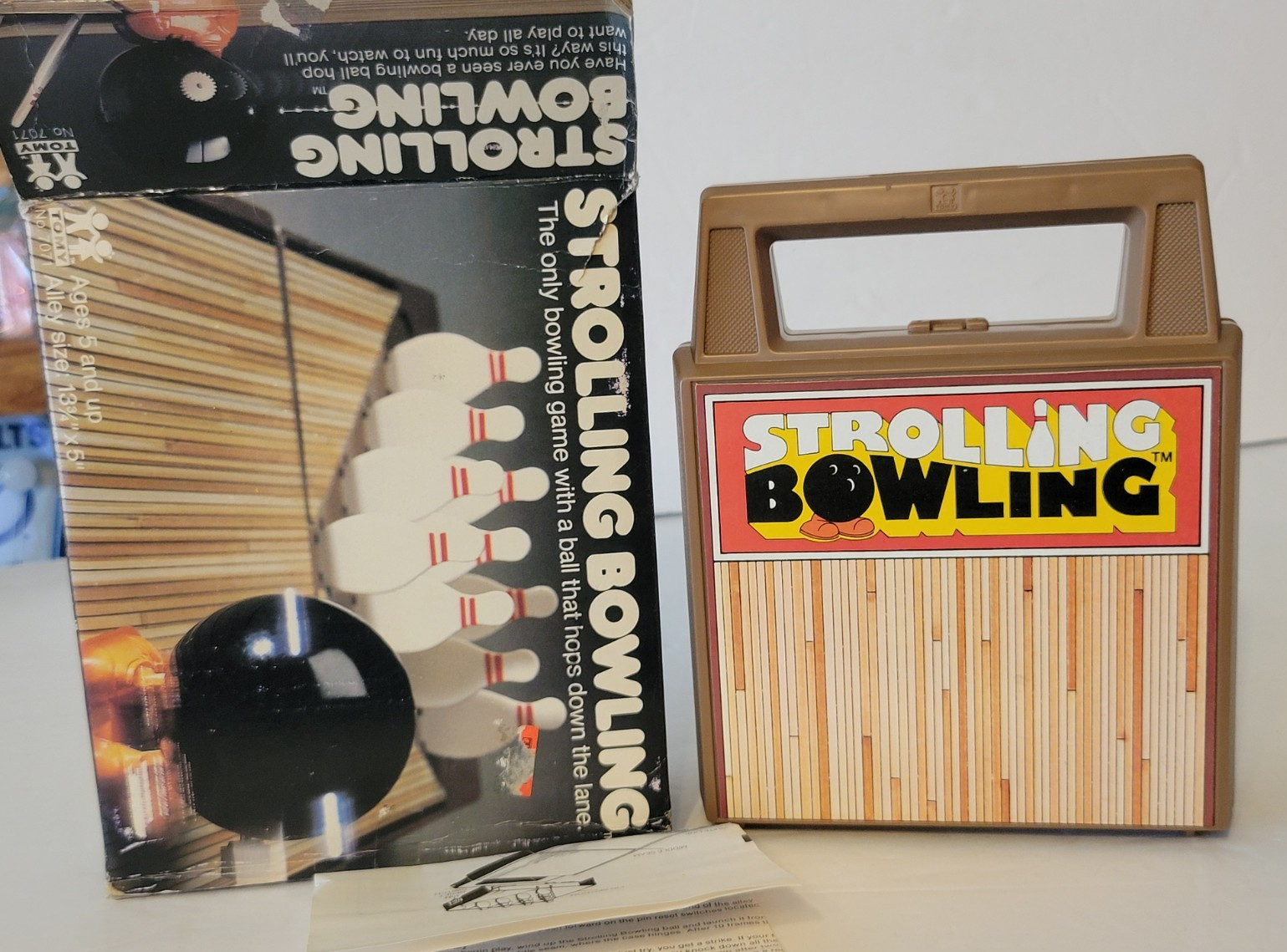 VINTAGE 1980s TOMY WIND UP STROLLING BOWLING GAME WITH BOX WORKING