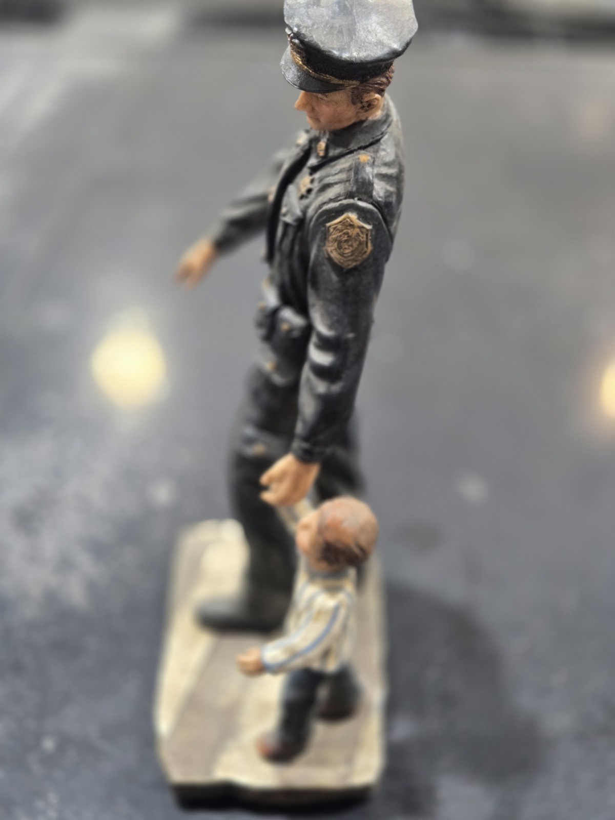 Police Oficer and Child in Crosswalk Statue. 10.5" X 5.75".