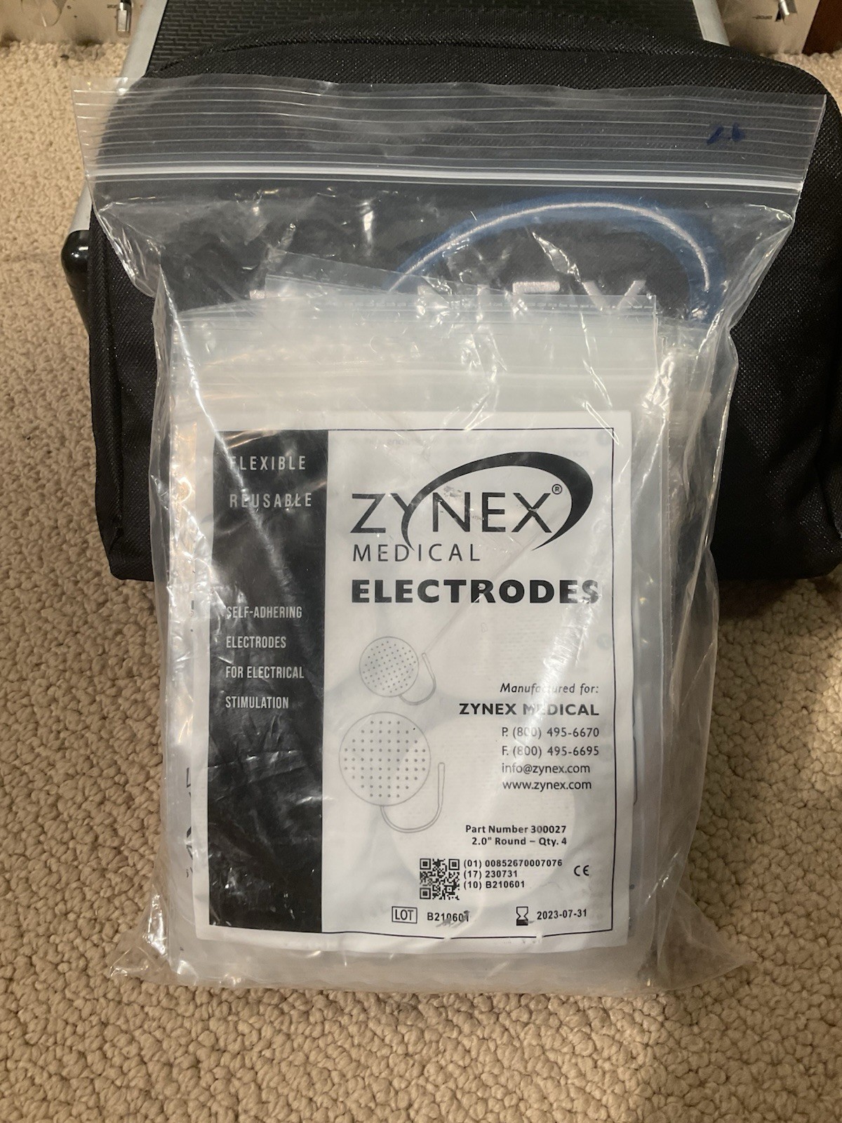 MINT Zynex Medical NexWave Electrotherapy Device Kit 27 Electrodes 4 Batteries