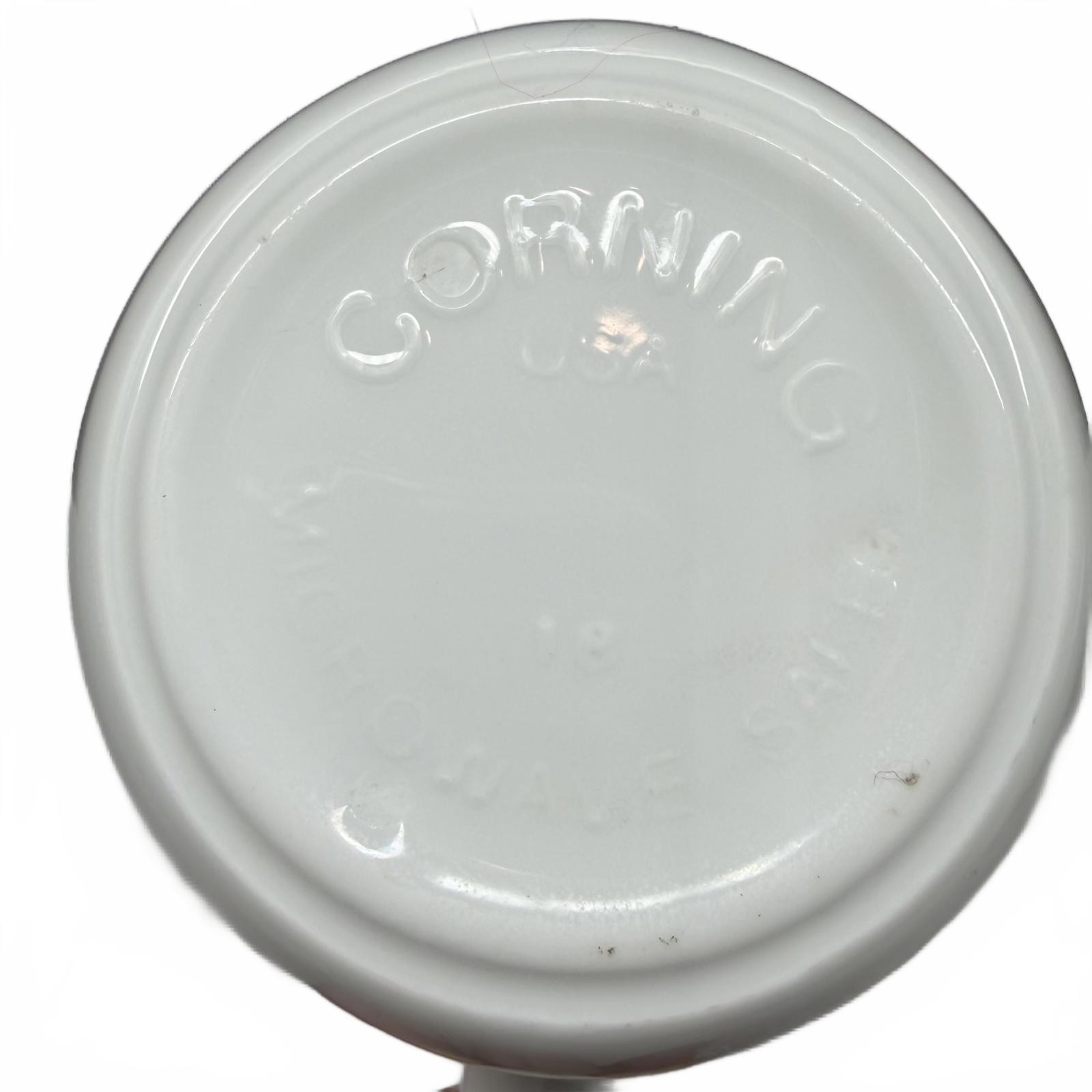 Two white Corning Ware Old Town Blue ceramic mugs with blue floral border.