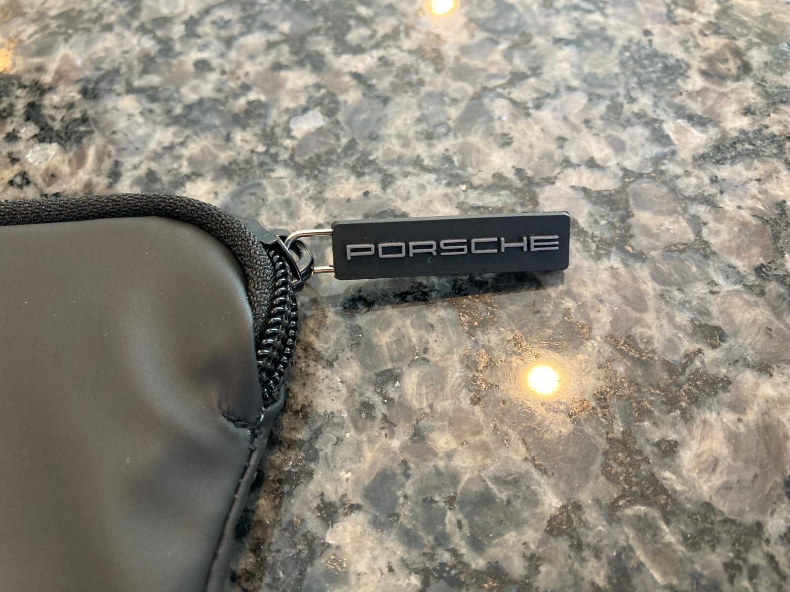 PORSCHE DESIGN OEM FACTORY STEERING WHEEL PROTECTIVE COVER IN BLACK W/CREST. NEW