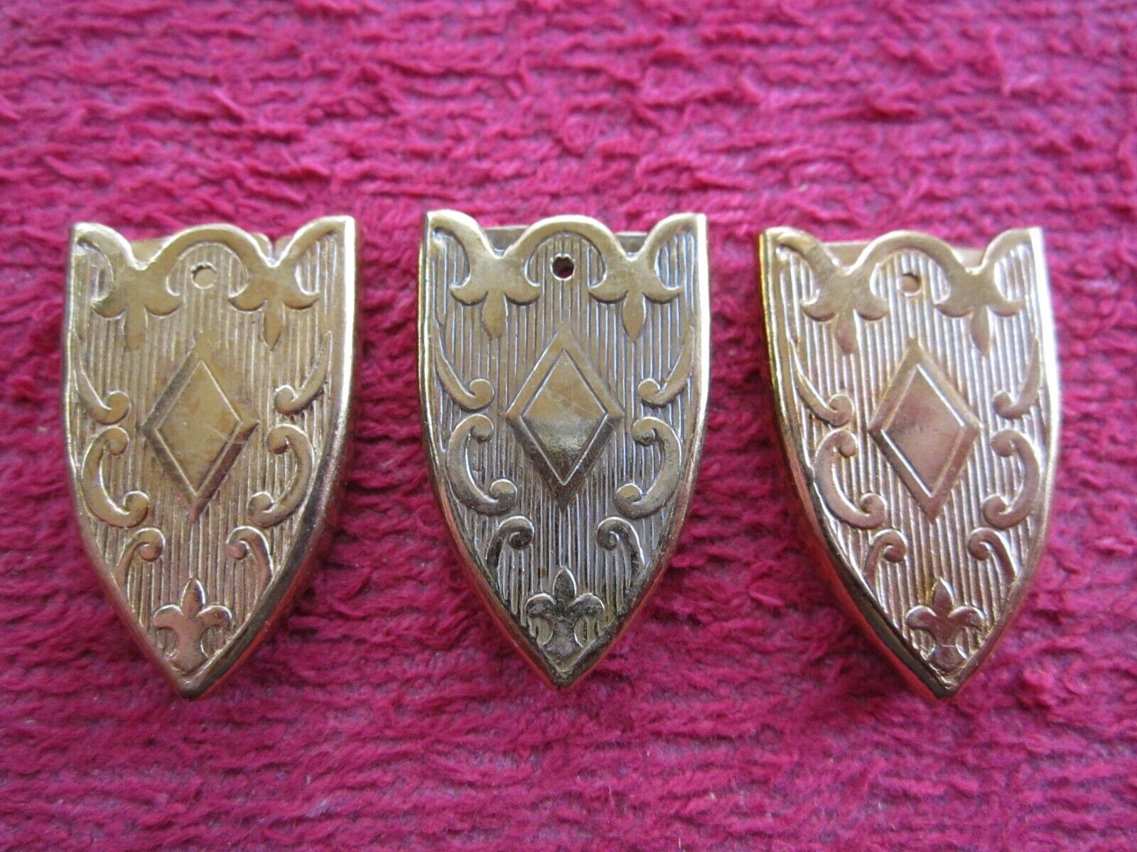 3 VINTAGE LEATHER or CLOTH BELT END TIPS, EMBOSSED, 3/4" BRASS TONE, NOS
