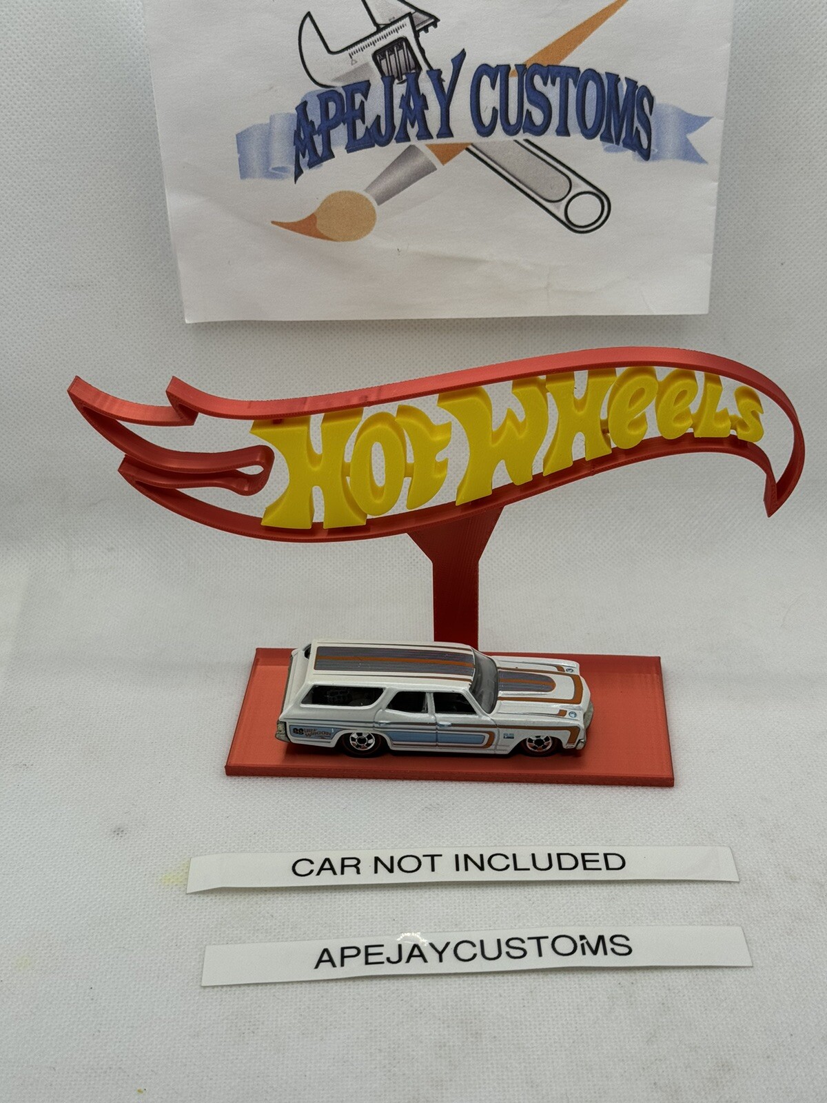 red hotwheels stand, sign , display