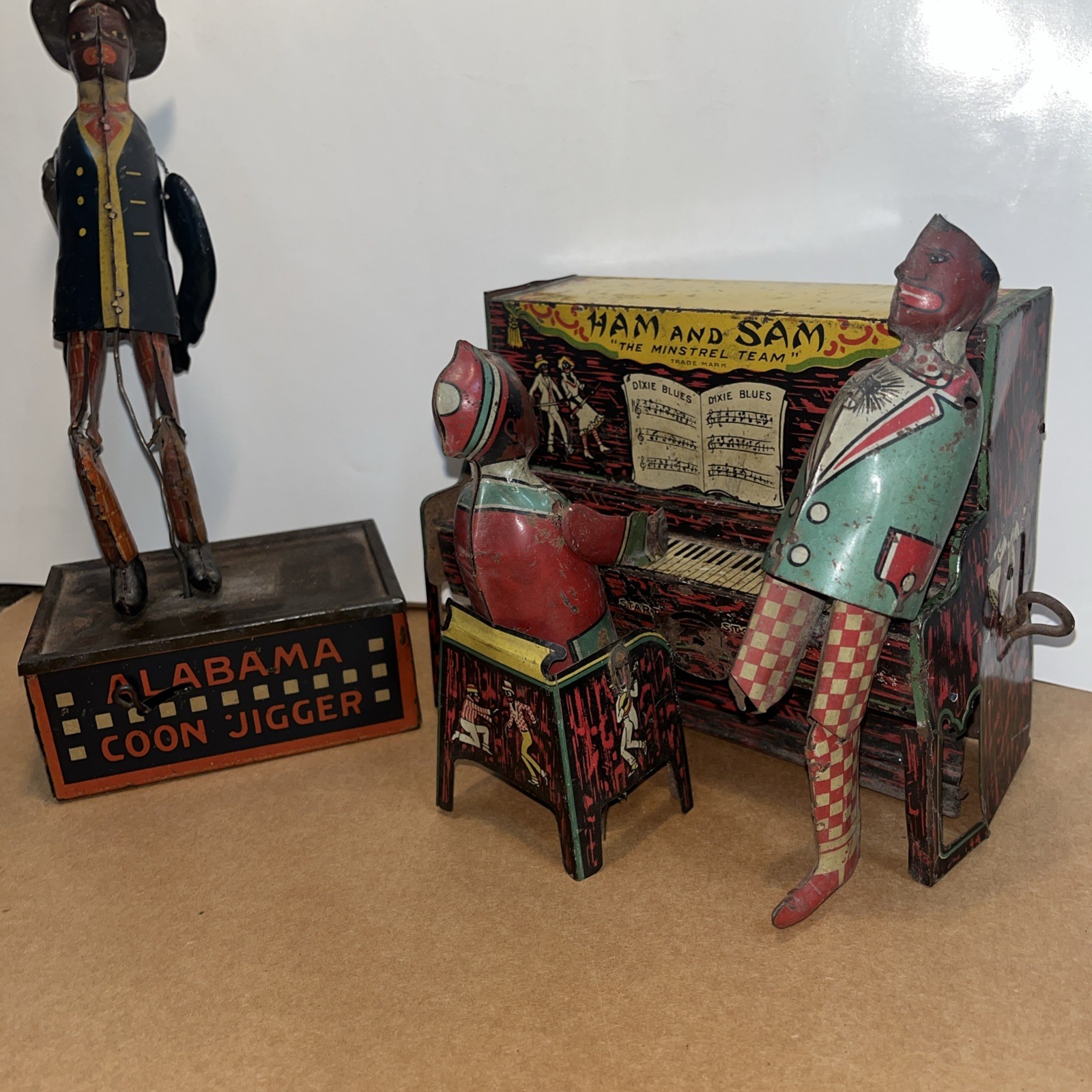 Set of 2 tin toys Ham and Sam The Minstrel Team & “TOMBO “Alabama Coon Jigger