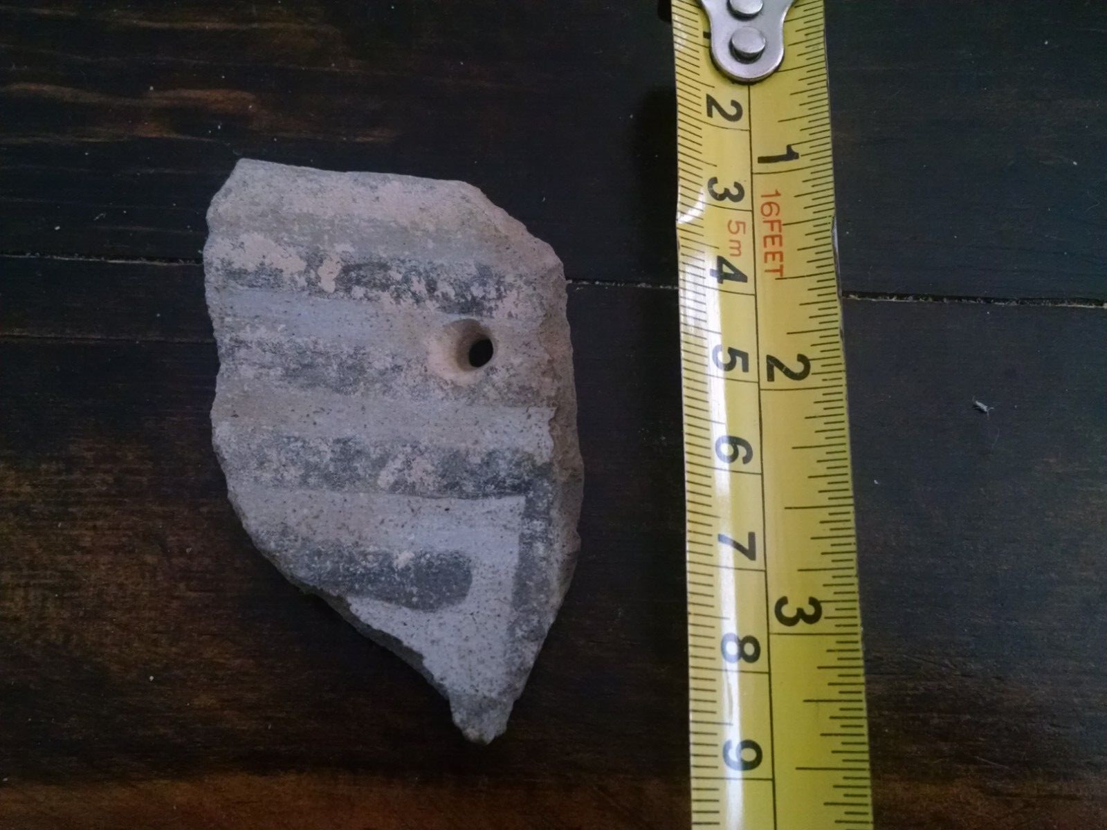 Authentic Anasazi Indian pottery shard with hole New Mexico