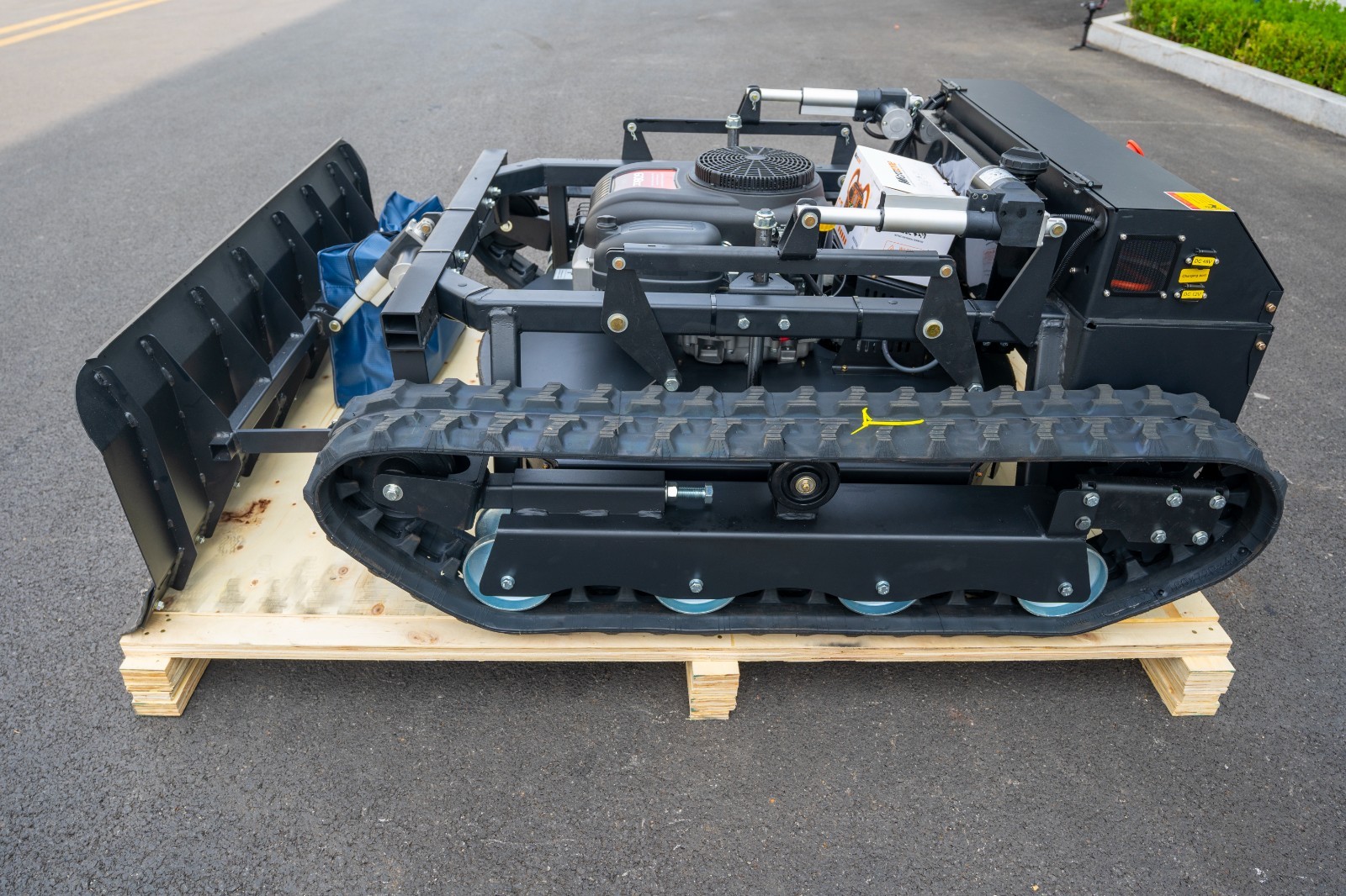 Remote-controlled lawnmower with snowplow for a limited time, available for snow