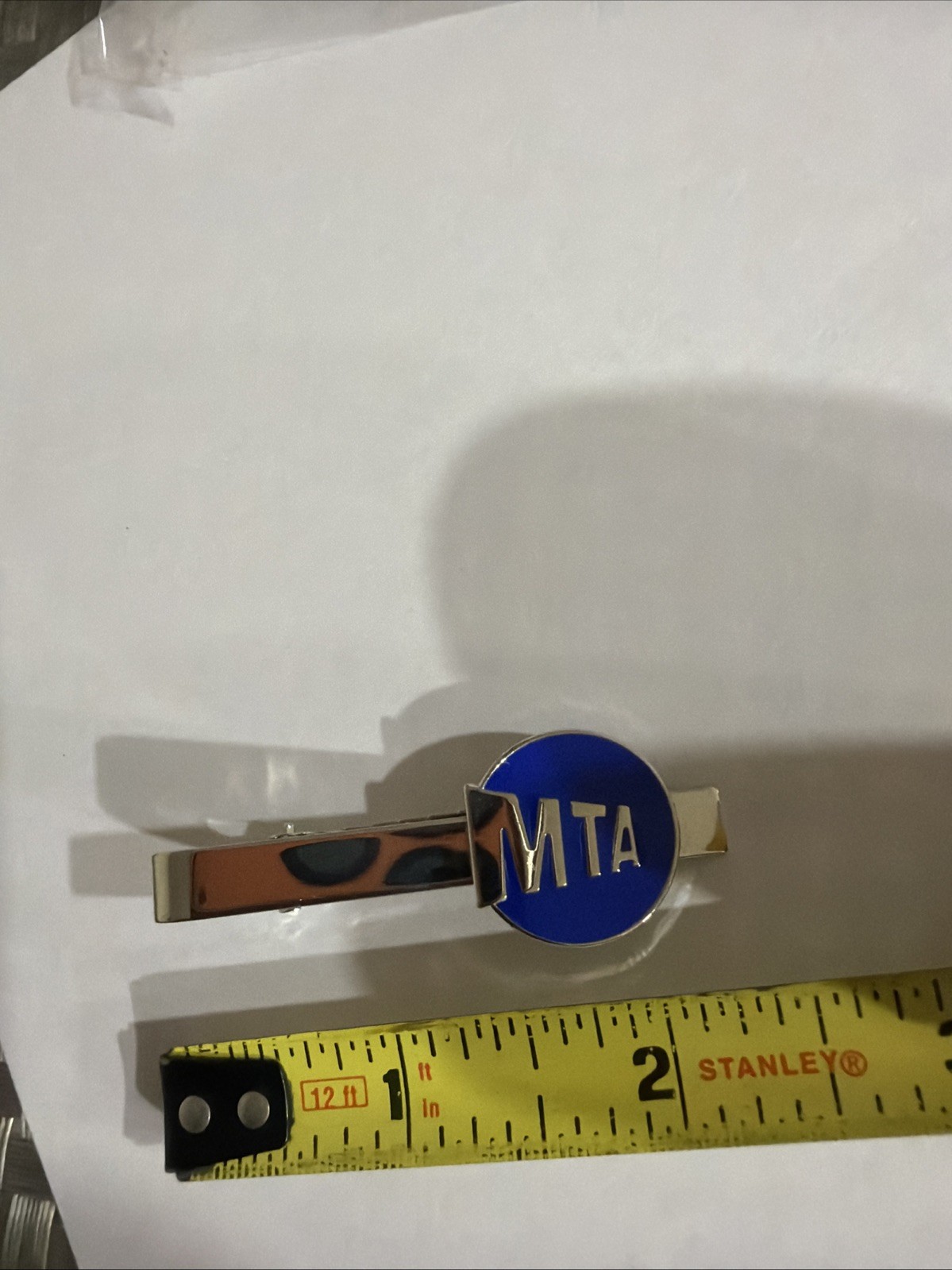 MTA Tie Clasp. Length 2 Inches Color Silver.
