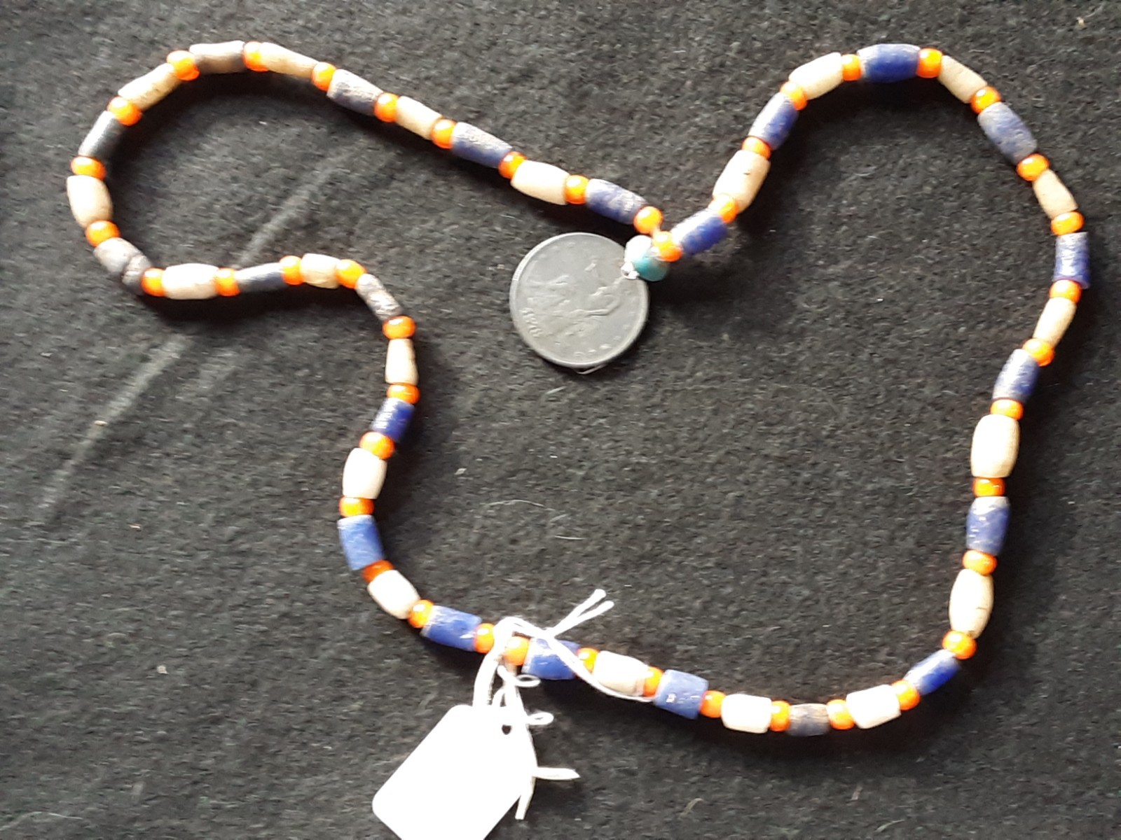 1878 TRADE DOLLAR  COPY, ON LEATHER STRUNG TRADE NECKLACE,  WHA-0226*09102