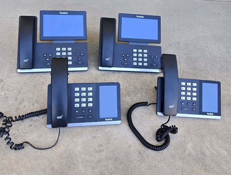 Lot of Yealink Smart Business Phones (2) SIP-T58A + (2) SIP-T55A