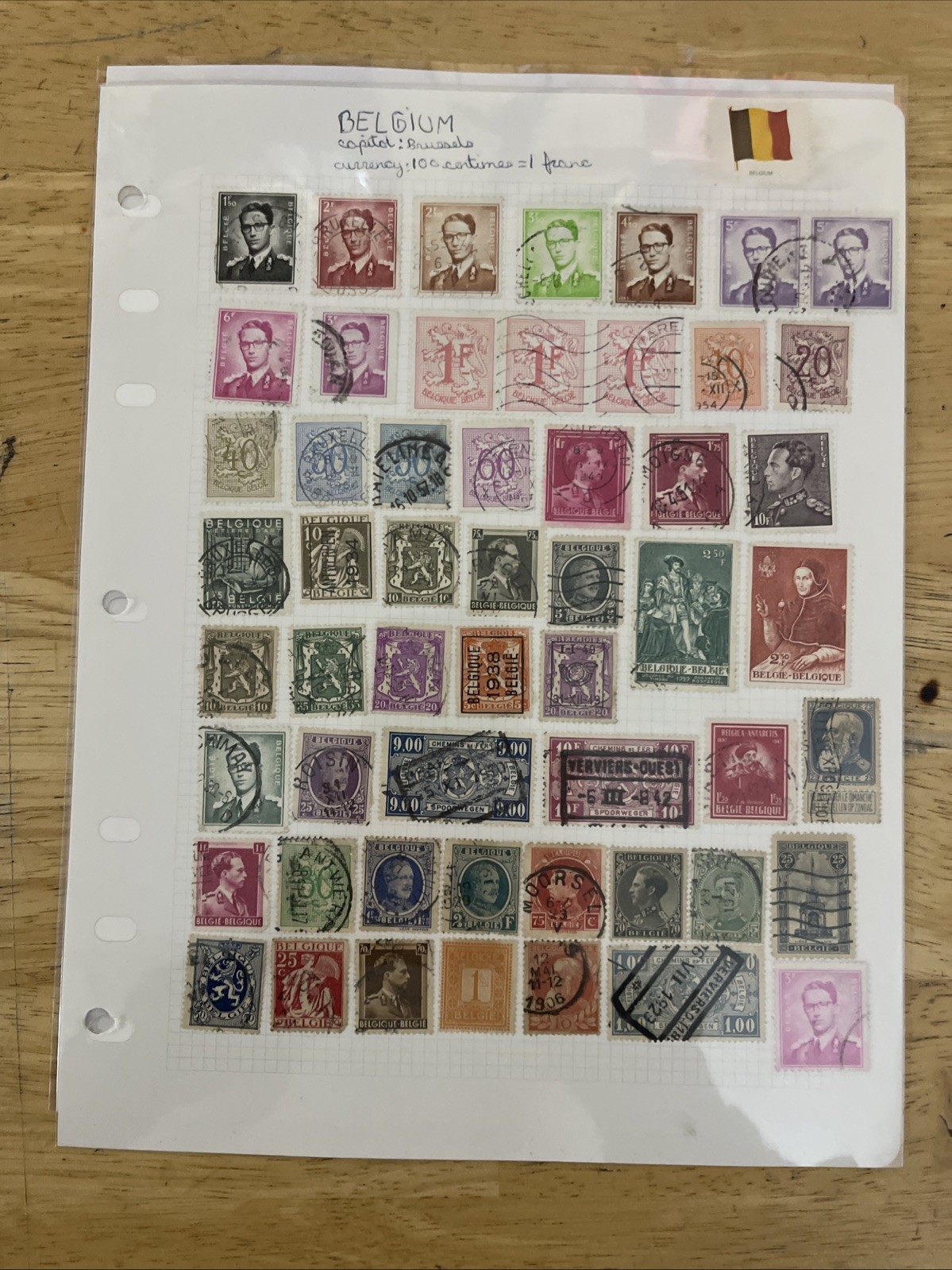 Lot of new and used stamps from all over the world. ON Paper.