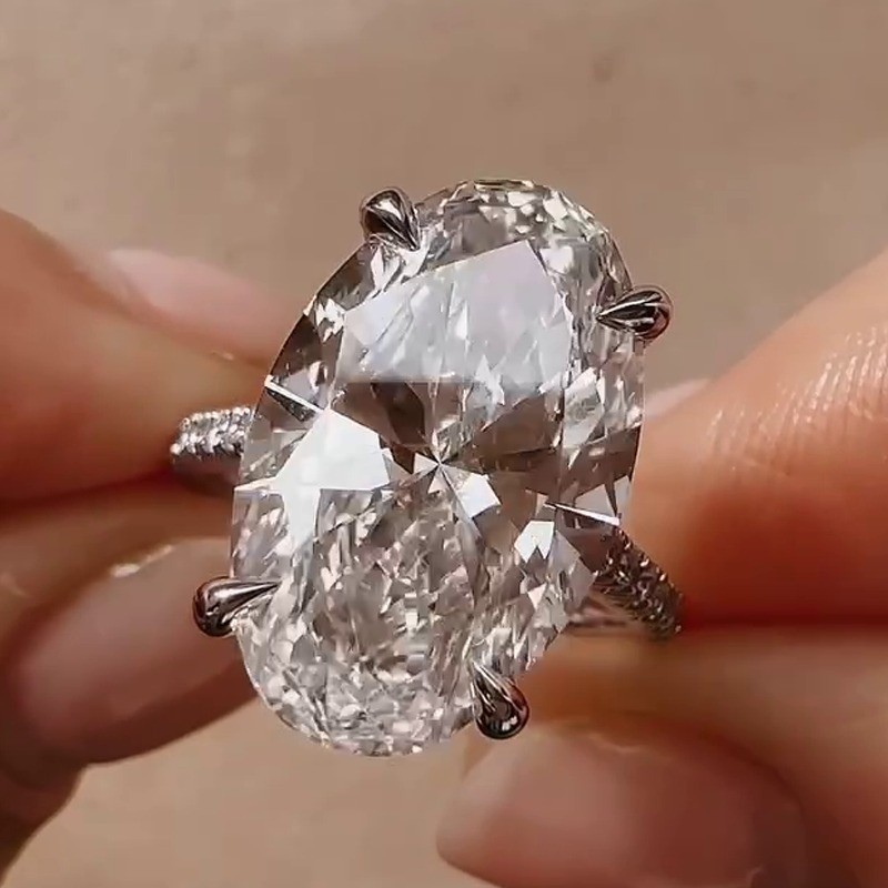 6.3 TCW Oval Cut Moissanite Hidden Halo Engagement Ring In 14k White Gold Plated