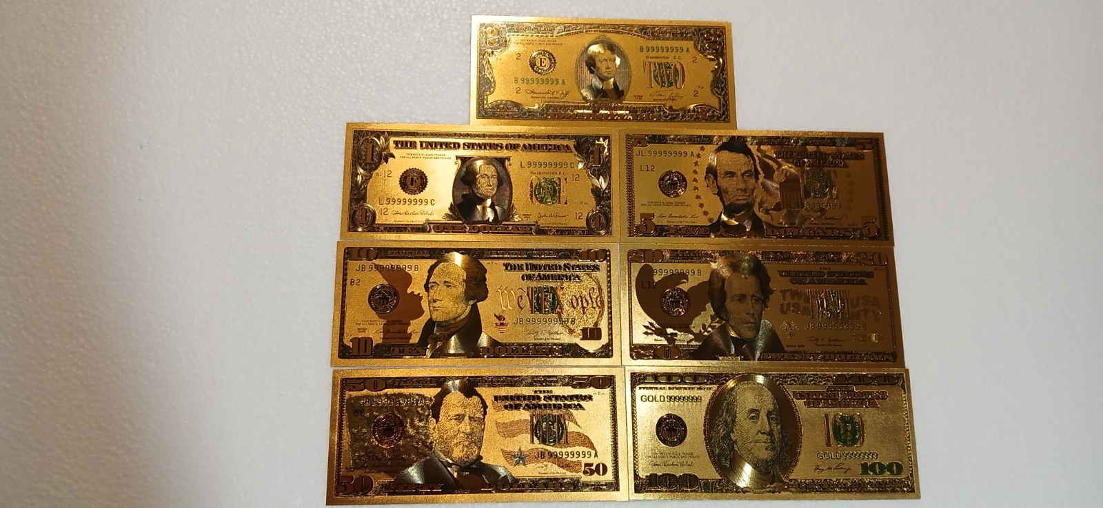 Lot of 80 novelty US coins and bills.