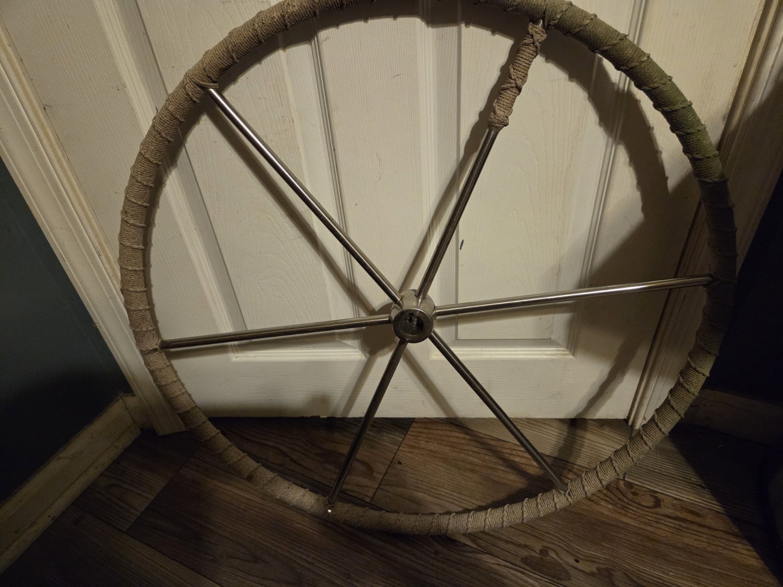 stainless steel sailboat steering wheel, sometimes called a destroyer wheel