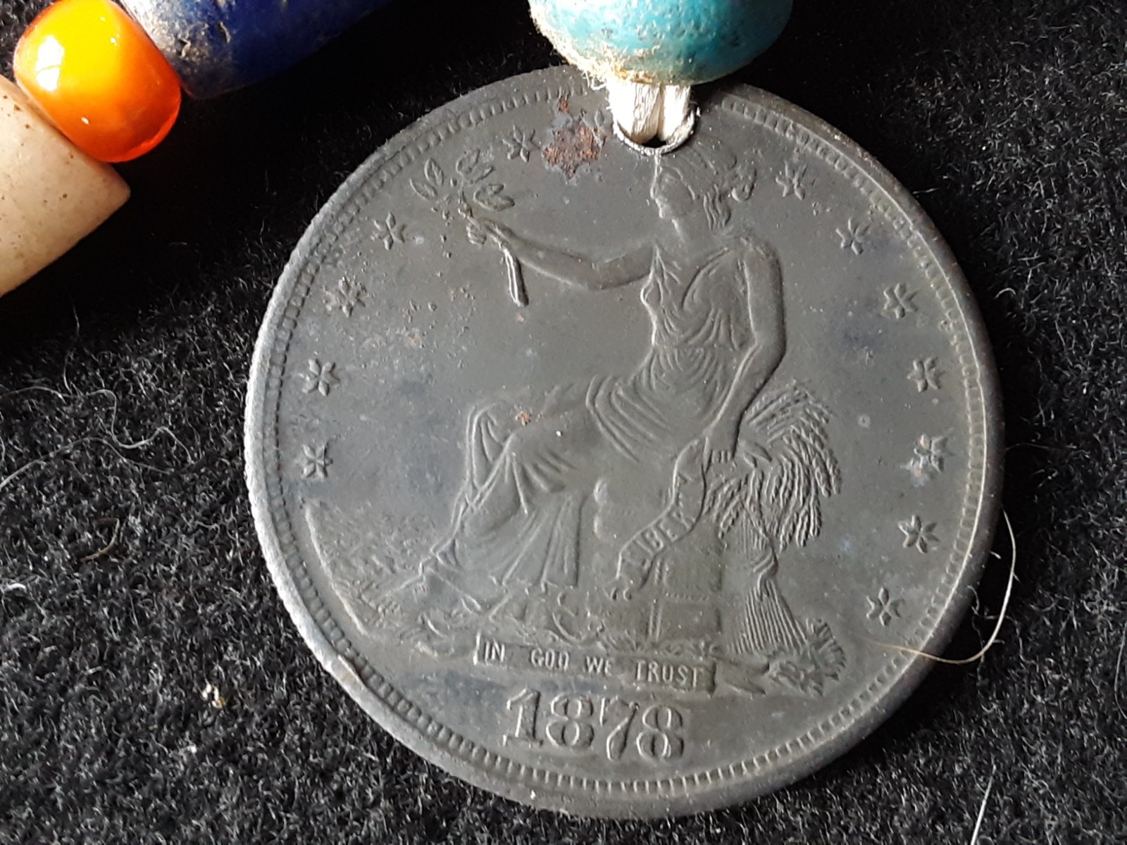 1878 TRADE DOLLAR COPY, ON LEATHER STRUNG TRADE NECKLACE, WHA-0226*09102